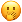 With_hand_over_mouth